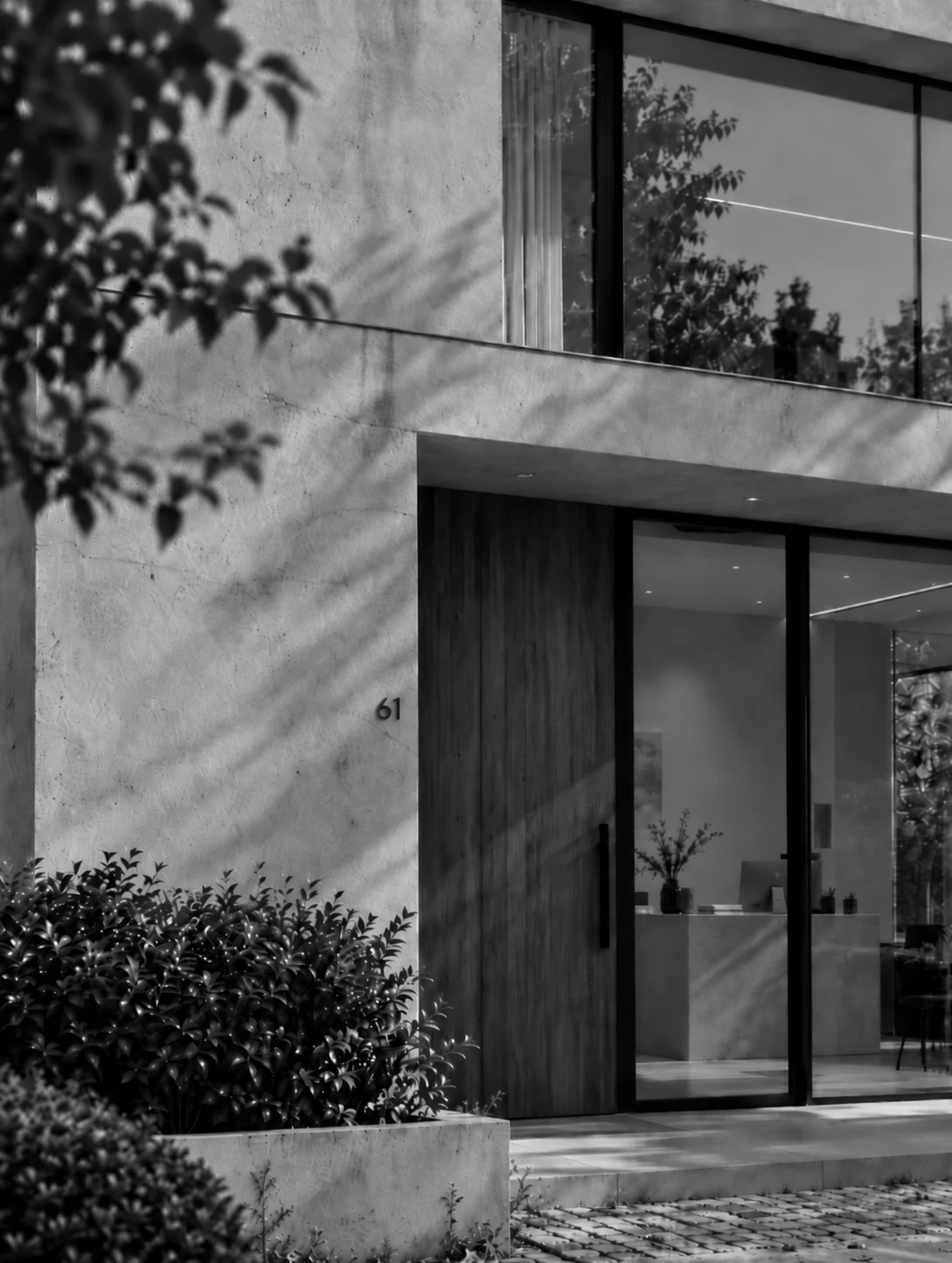 Black-and-white architectural concept of an Arial Studio entrance.